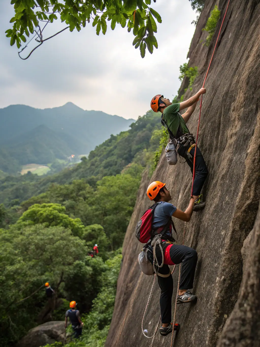 A photograph capturing a group of teenagers participating in a rock climbing session, emphasizing teamwork and problem-solving skills.
